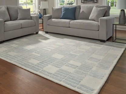 Haines Furniture Outlet - Ashley Furniture - Dylanton Rug - 5' x 7' Area Rug / Ivory/Blue - R407812