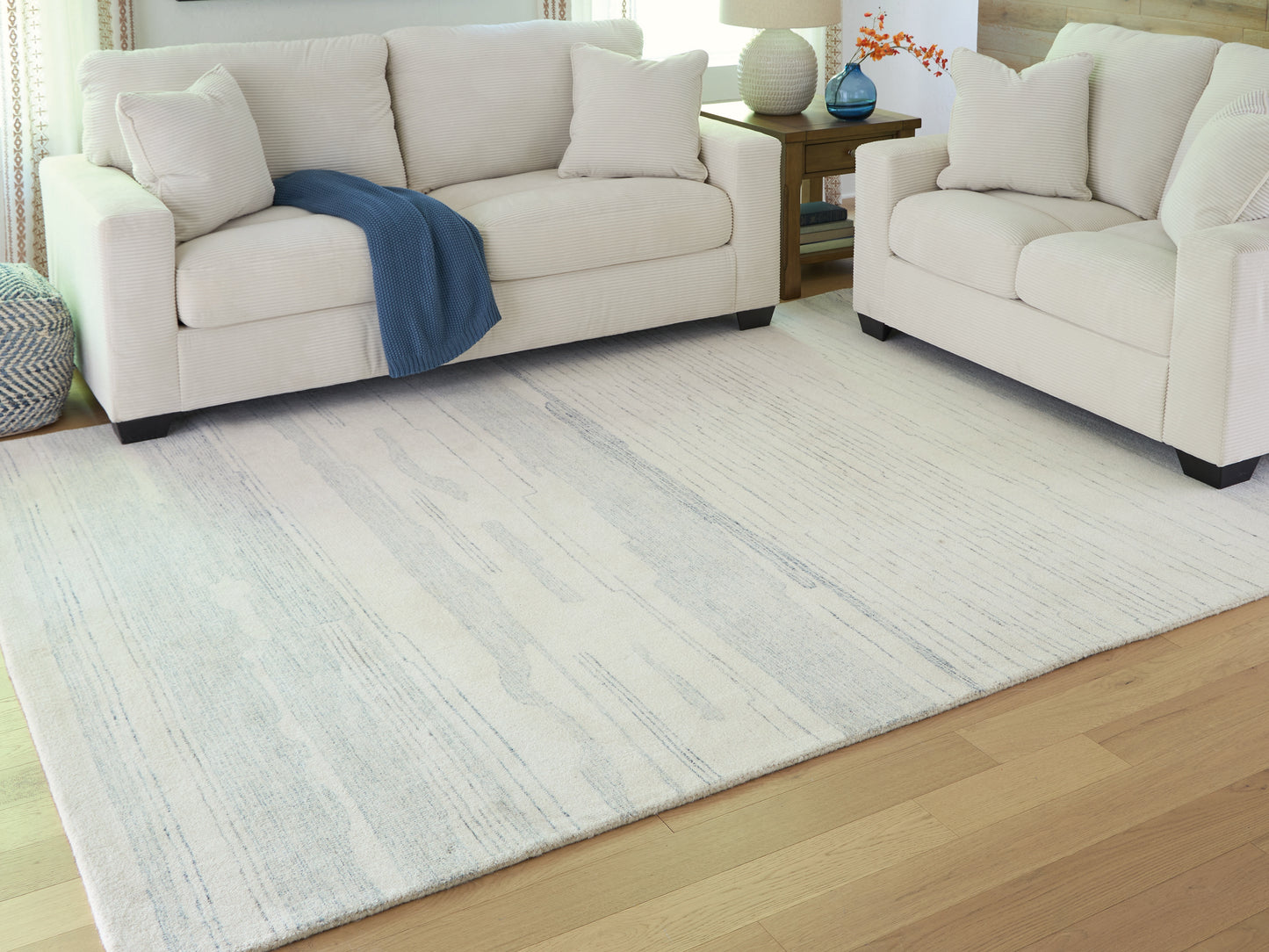 Haines Furniture Outlet - Ashley Furniture - Genemost Rug - 7'8" x 10' Area Rug / Ivory/Blue - R407841