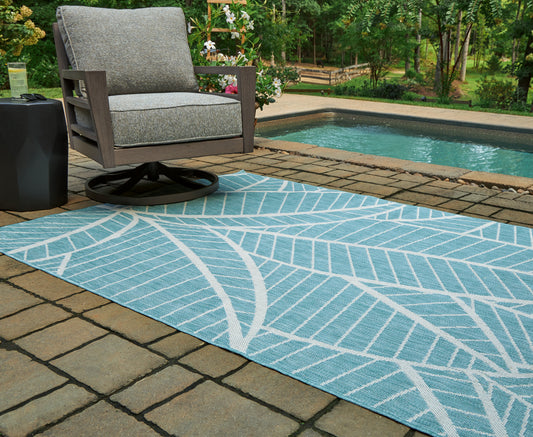Haines Furniture Outlet - Ashley Furniture - Hulsia Rug - 5' x 7' Rug / Ivory/Aqua - R900122