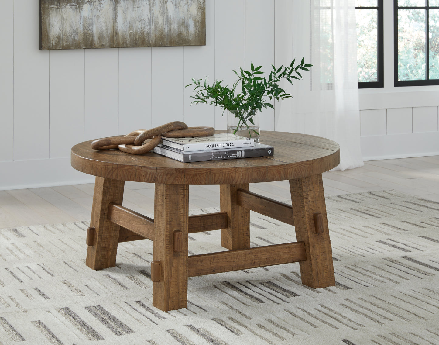 Haines Furniture Outlet - Ashley Furniture - Mackifeld Coffee Table - Round Cocktail Table / Warm Brown - T724-8