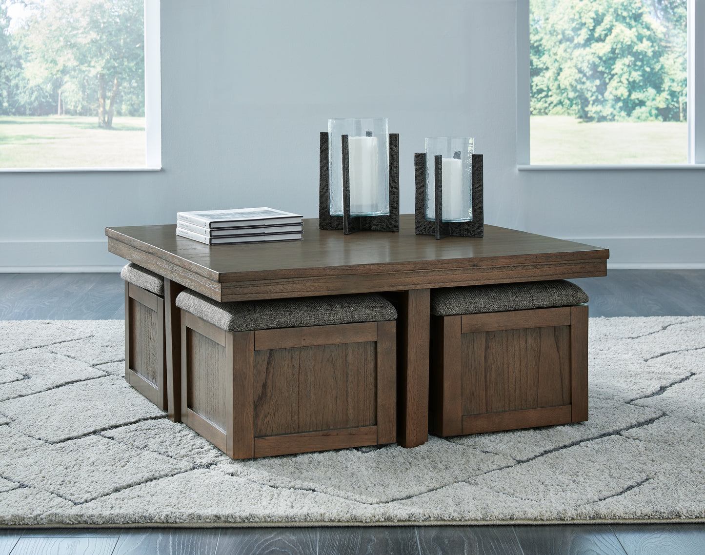 Haines Furniture Outlet - Ashley Furniture - Boardernest Coffee Table with 4 Stools - Cocktail TBL w/4 Stools (5/CN) / Brown - T738-20