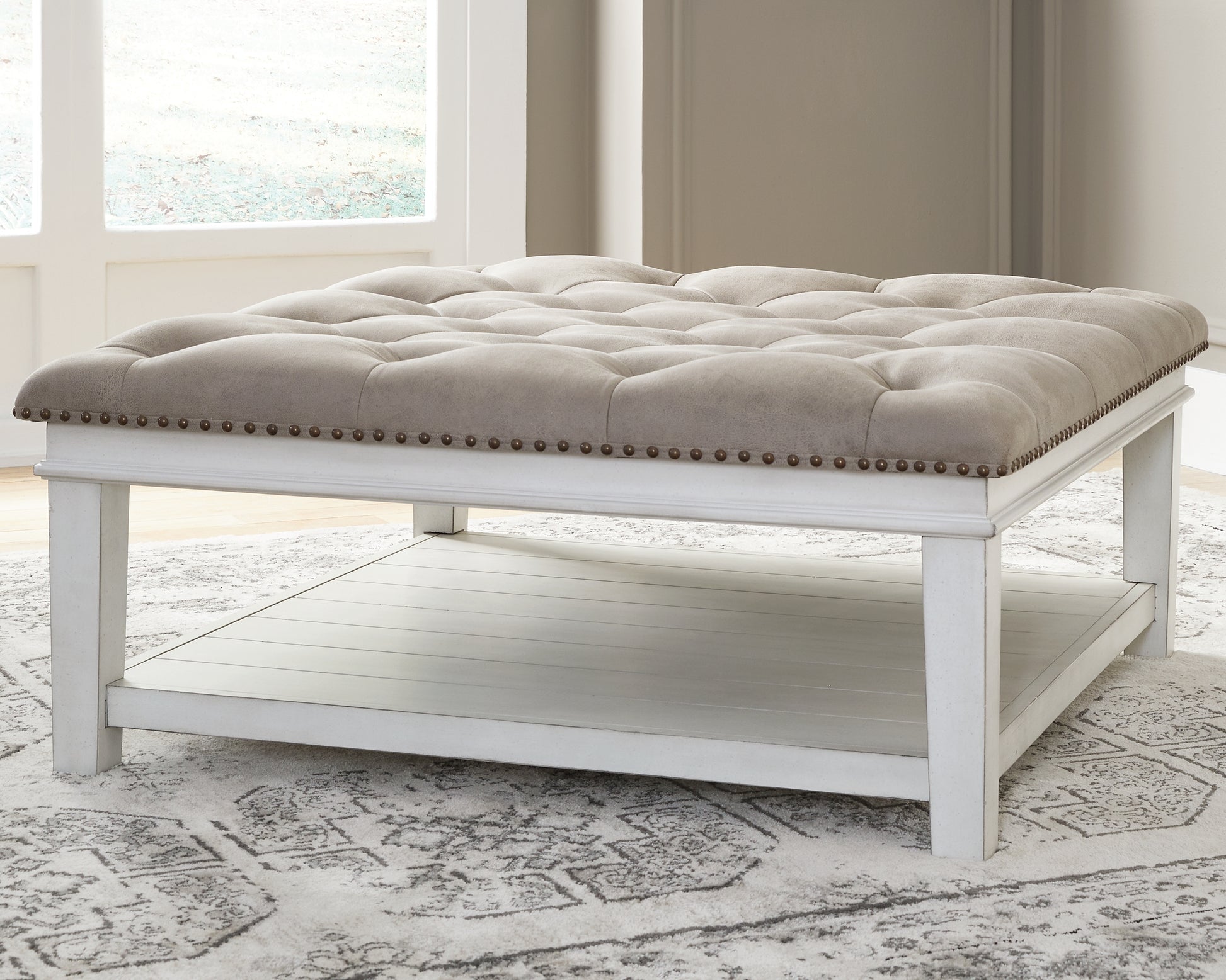 Haines Furniture Outlet - Ashley Furniture - Kanwyn Upholstered Ottoman Coffee Table - UPH Ottoman Cocktail Table / Whitewash - T937-21