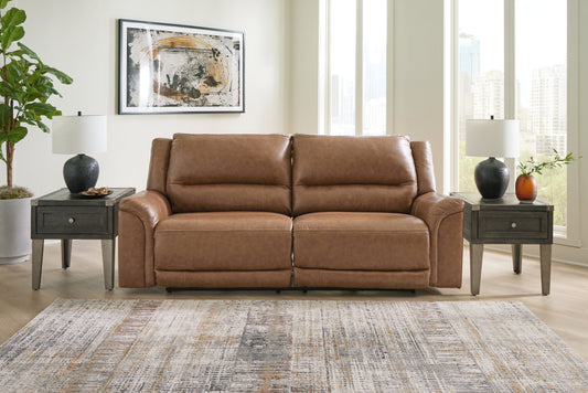 Haines Furniture Outlet - Ashley Furniture - Trasimeno Living Room - PWR Recliner/ADJ Headrest / Caramel - U8281513