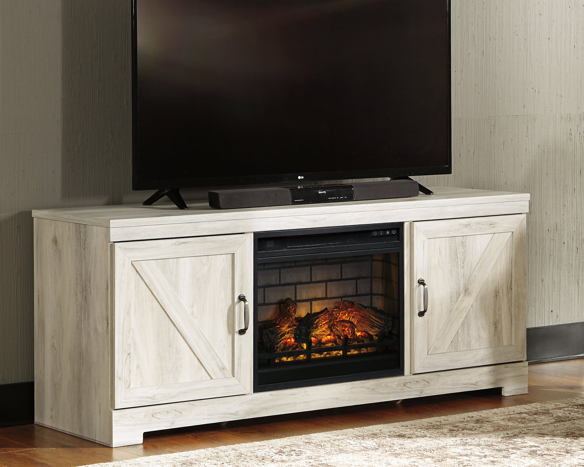 Haines Furniture Outlet - Ashley Furniture - Bellaby 63" TV Stand with Electric Fireplace - 63" TV Stand with Electric Fireplace / Whitewash - W331W9