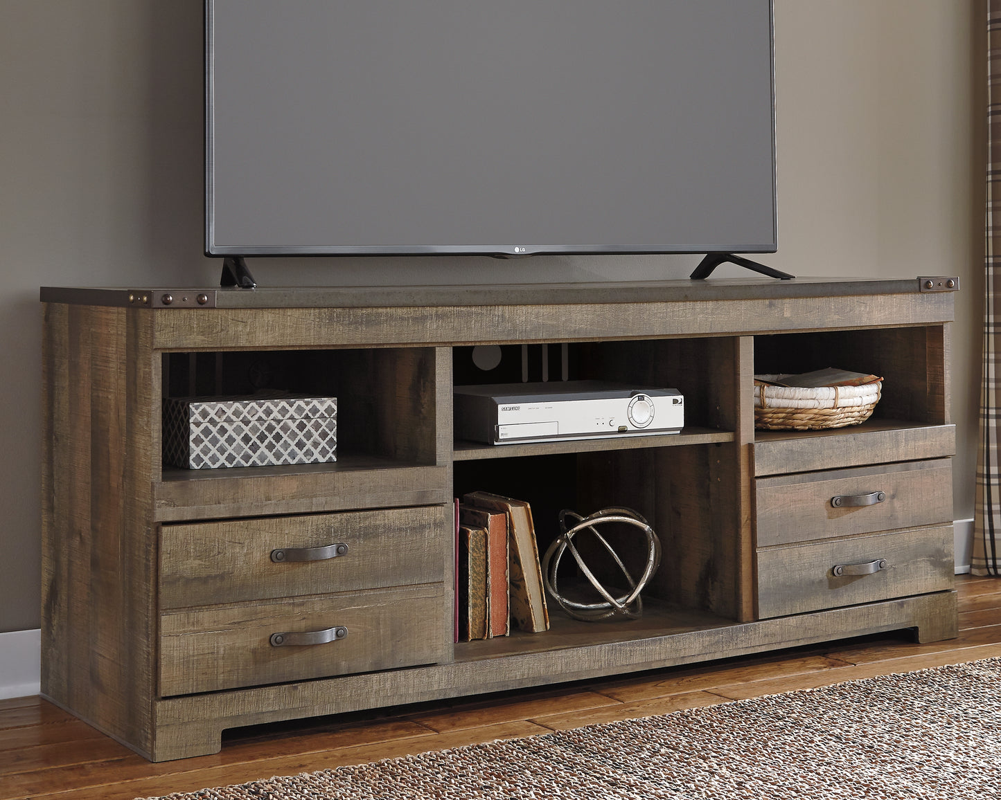 Haines Furniture Outlet - Ashley Furniture - Trinell TV Stand - 63" / Brown - W446-68