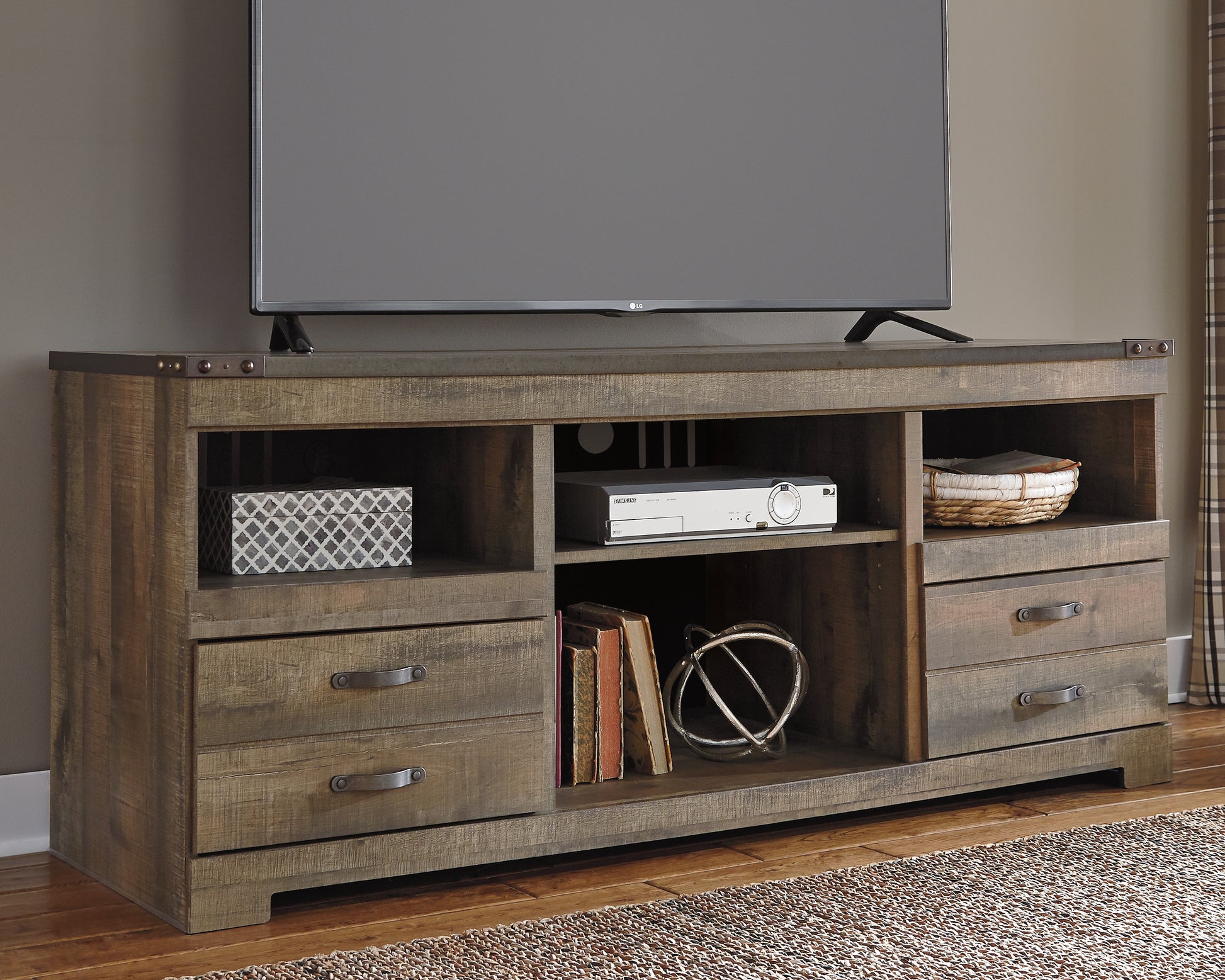 Haines Furniture Outlet - Ashley Furniture - Trinell TV Stand - 63" / Brown - W446-68