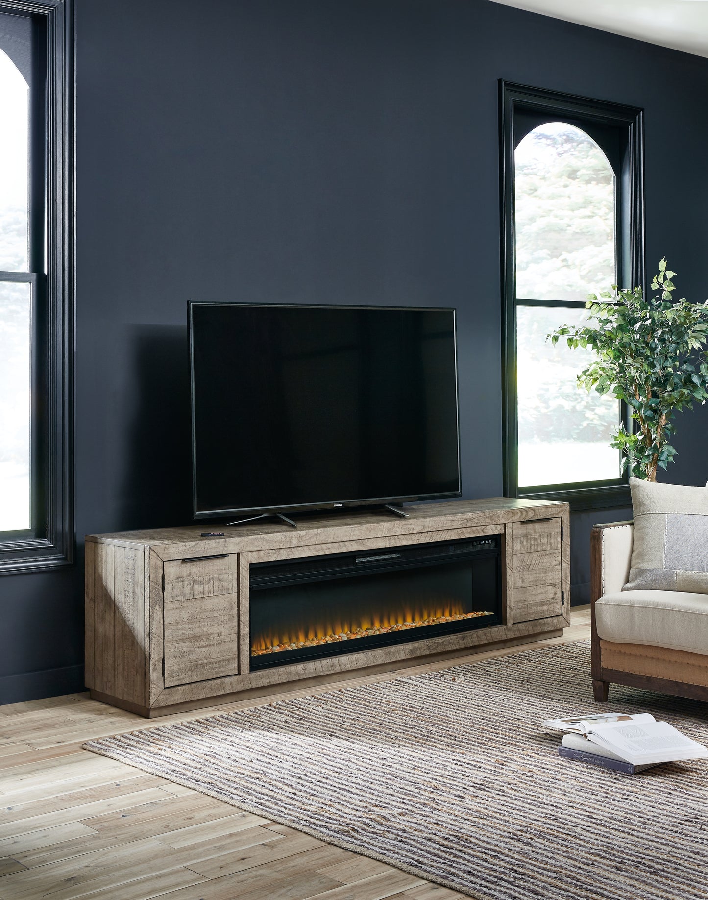 Haines Furniture Outlet - Ashley Furniture - Krystanza TV Stand with Electric Fireplace - TV Stand with Electric Fireplace / Weathered Gray - W760W1